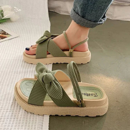 Sommerflipflop-sandaler med sommerknude