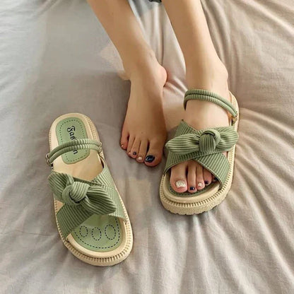 Sommerflipflop-sandaler med sommerknude